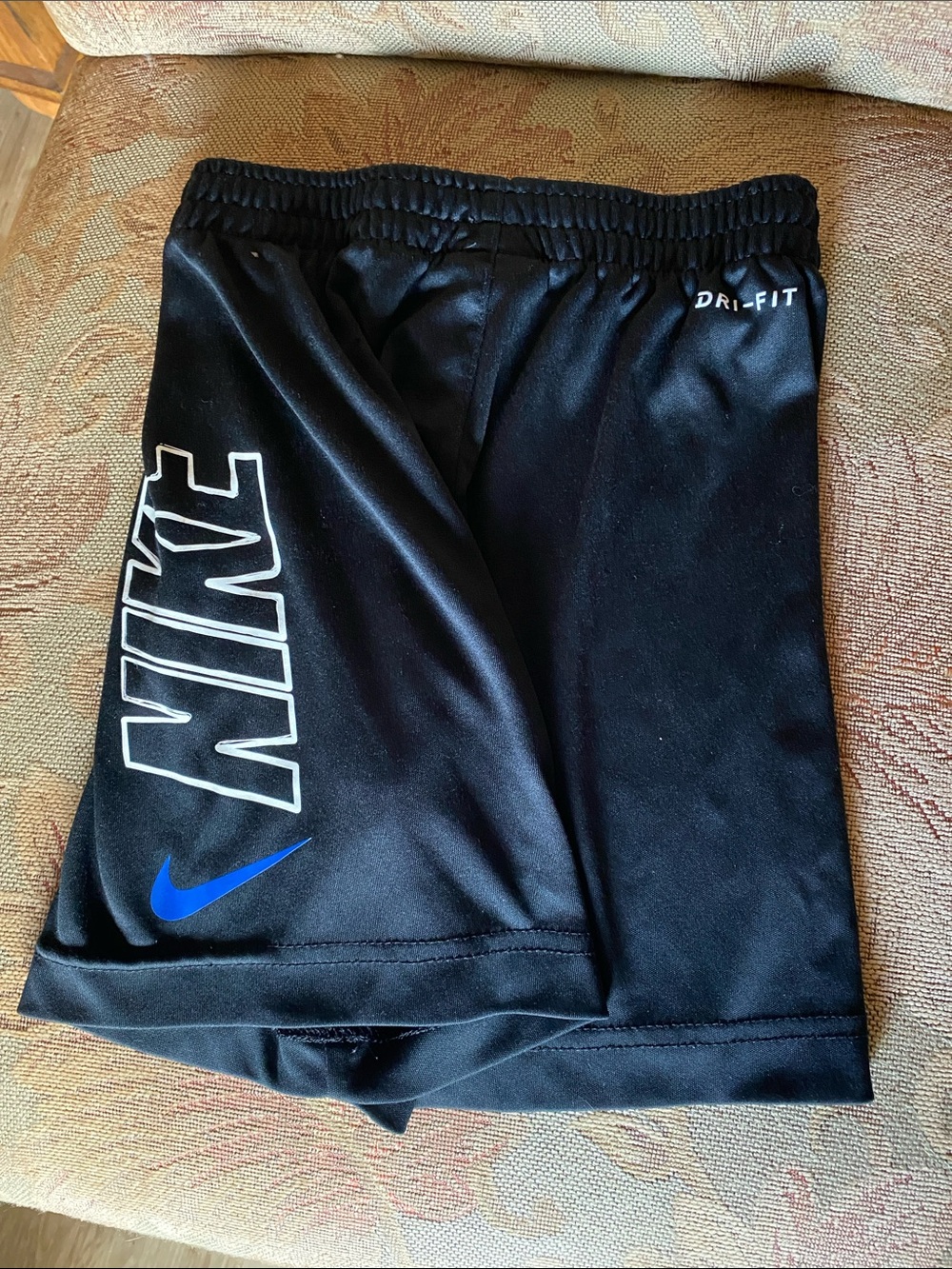 Nike Black Athletic Shorts with White Logo and Blue Swoosh